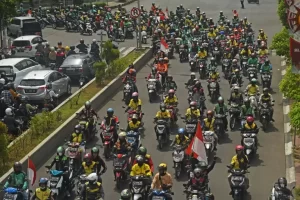 THR Ojol Cair Berupa Bonus Hari Raya, Begini Respons Grab kemudian Gojek